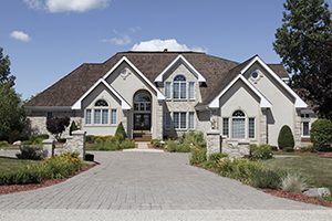 Exterior of a luxury home with a large driveway