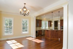 open kitchen and dining area with double hung windows